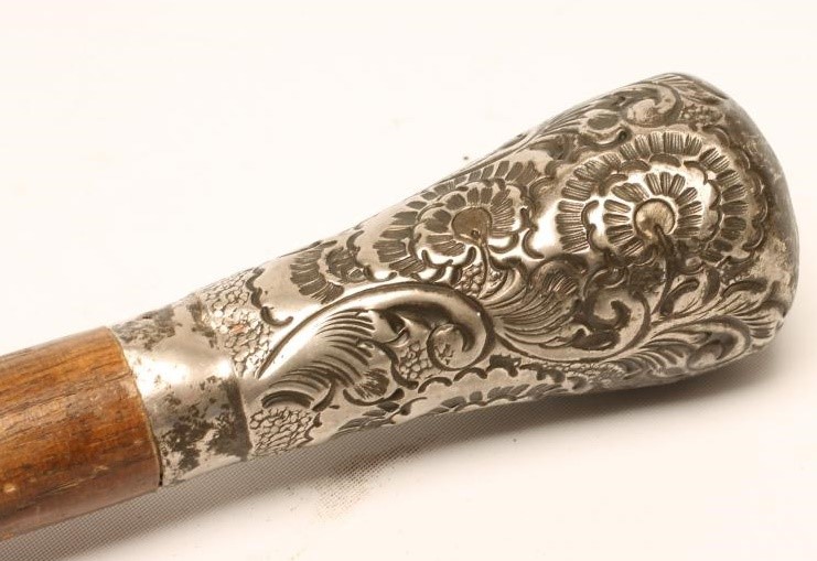 A SILVER TOPPED SWORD STICK Image