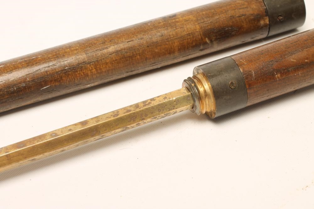 A SILVER TOPPED SWORD STICK Image