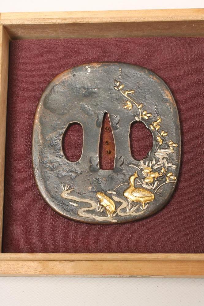 A JAPANESE BRONZE TSUBA Image