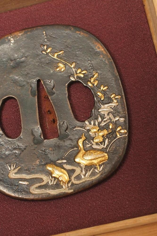 A JAPANESE BRONZE TSUBA Image