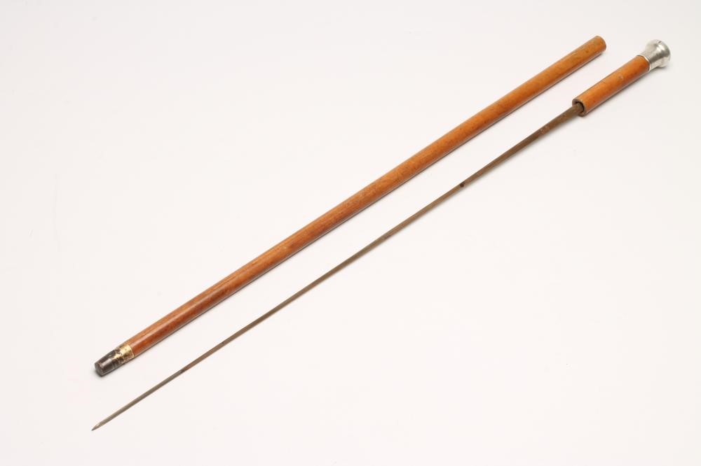 A SILVER TOPPED SWORD STICK Image