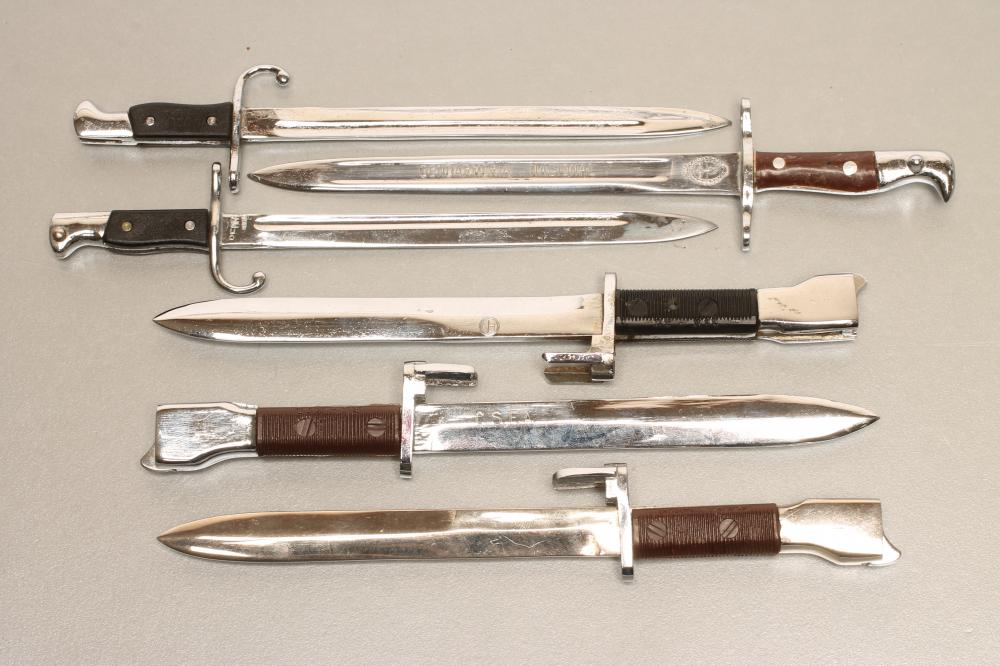 SIX ARGENTINIAN MINIATURE BAYONETS Image