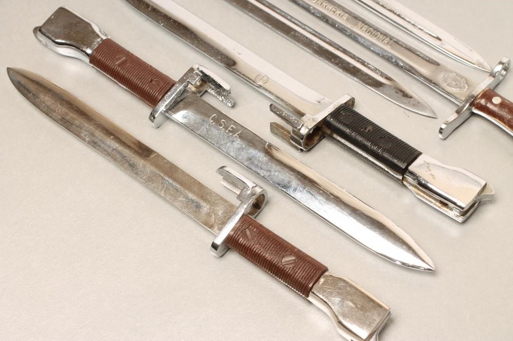 SIX ARGENTINIAN MINIATURE BAYONETS Image