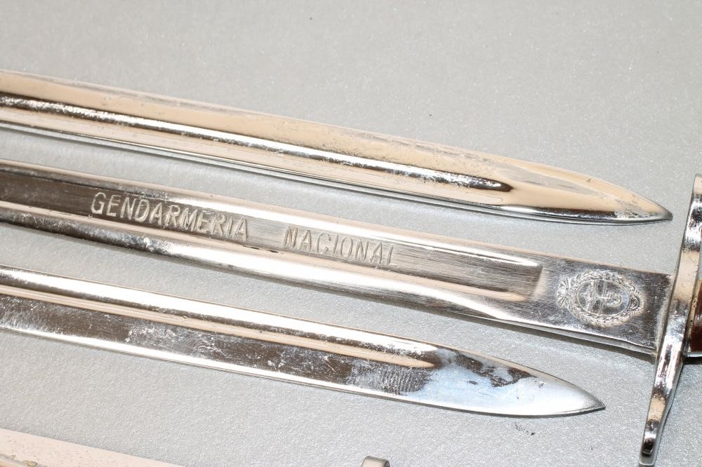 SIX ARGENTINIAN MINIATURE BAYONETS Image