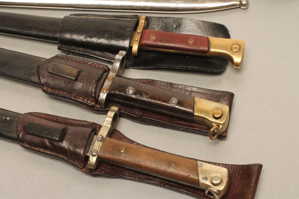 SIX EASTERN EUROPEAN MINIATURE BAYONETS Image