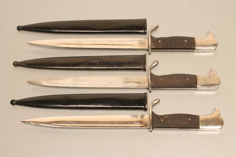 THREE GERMAN MINIATURE SOUVENIR BAYONETS Image