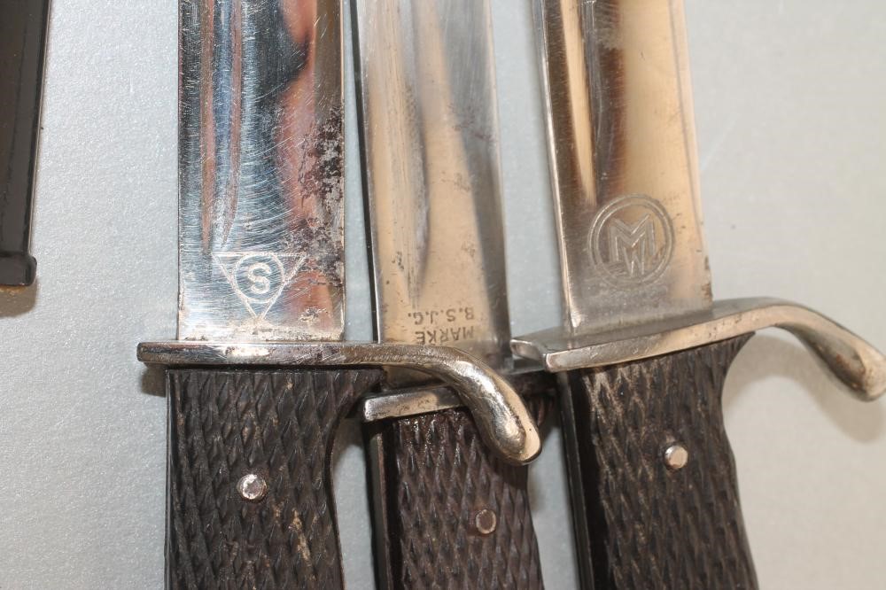 THREE GERMAN MINIATURE SOUVENIR BAYONETS Image