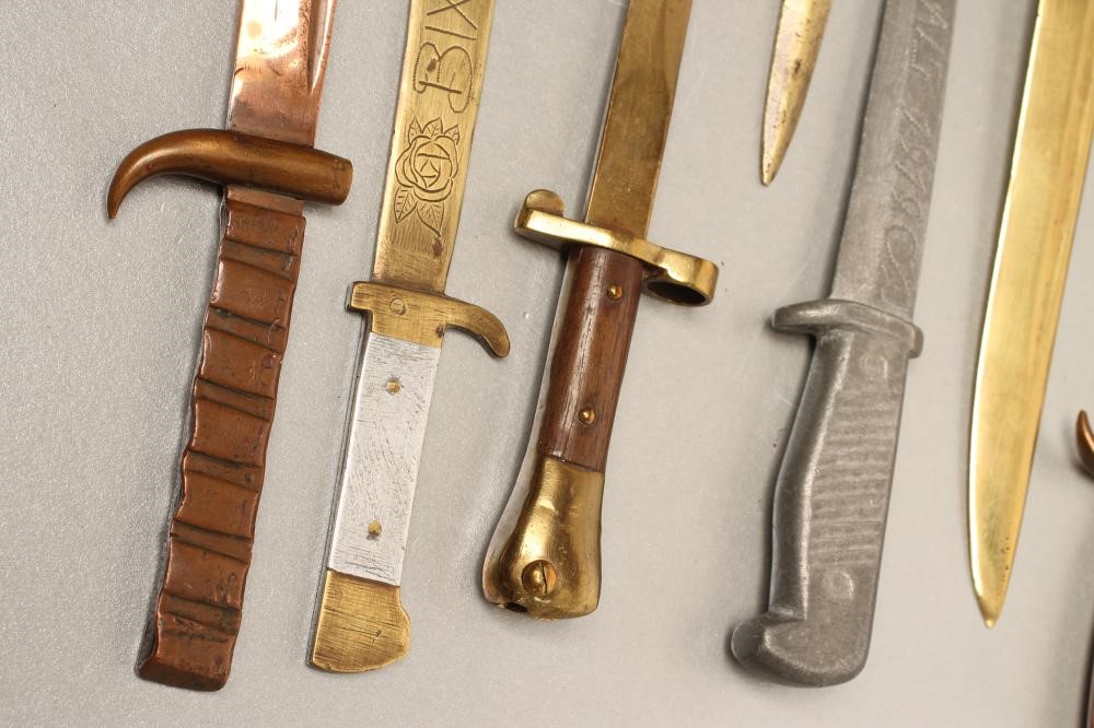 NINE TRENCH ART MINIATURE BAYONETS Image
