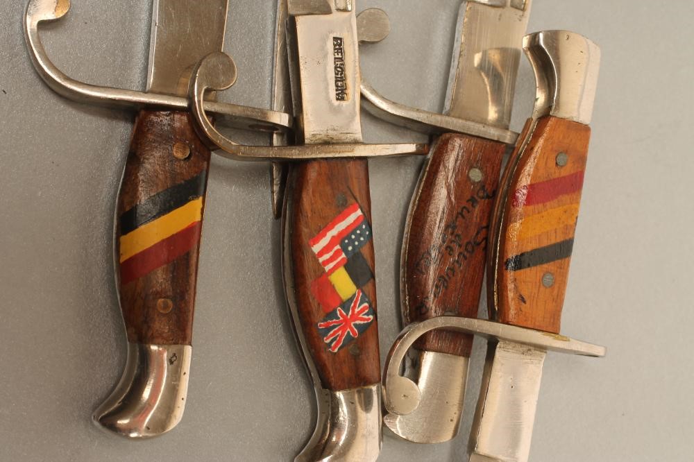 FIVE BELGIAN MINIATURE SOUVENIR BAYONETS Image