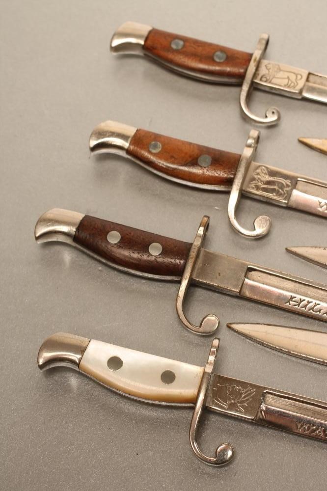 SEVEN BELGIAN SMALL SIZED LETTER OPENER BAYONETS Image