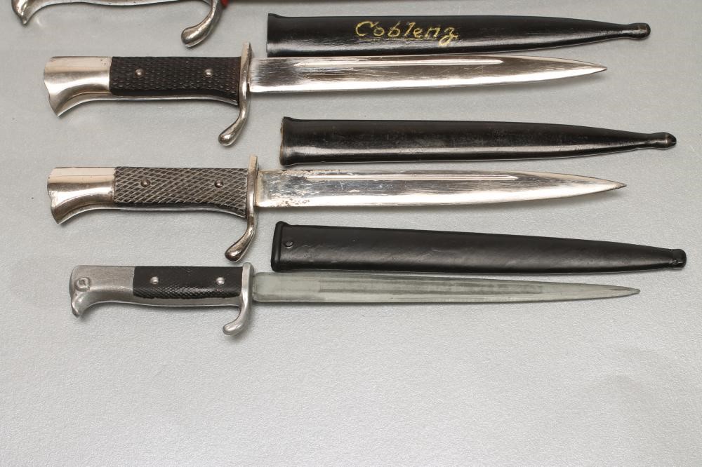 FOUR GERMAN MINIATURE SOUVENIR BAYONETS Image