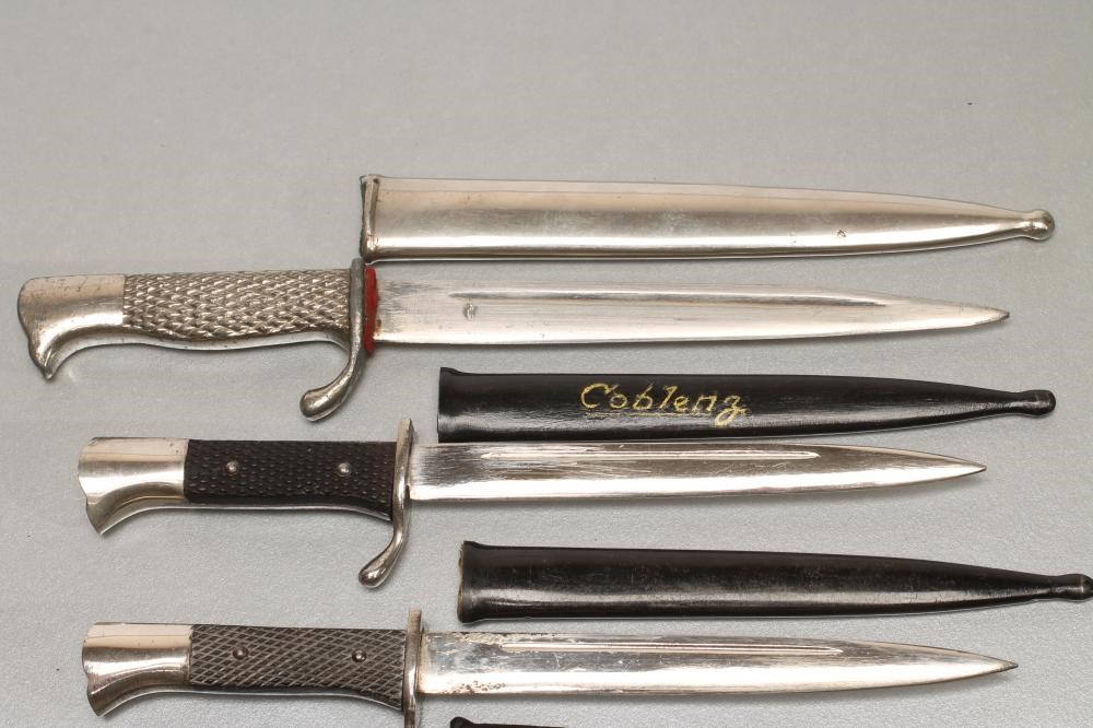 FOUR GERMAN MINIATURE SOUVENIR BAYONETS Image