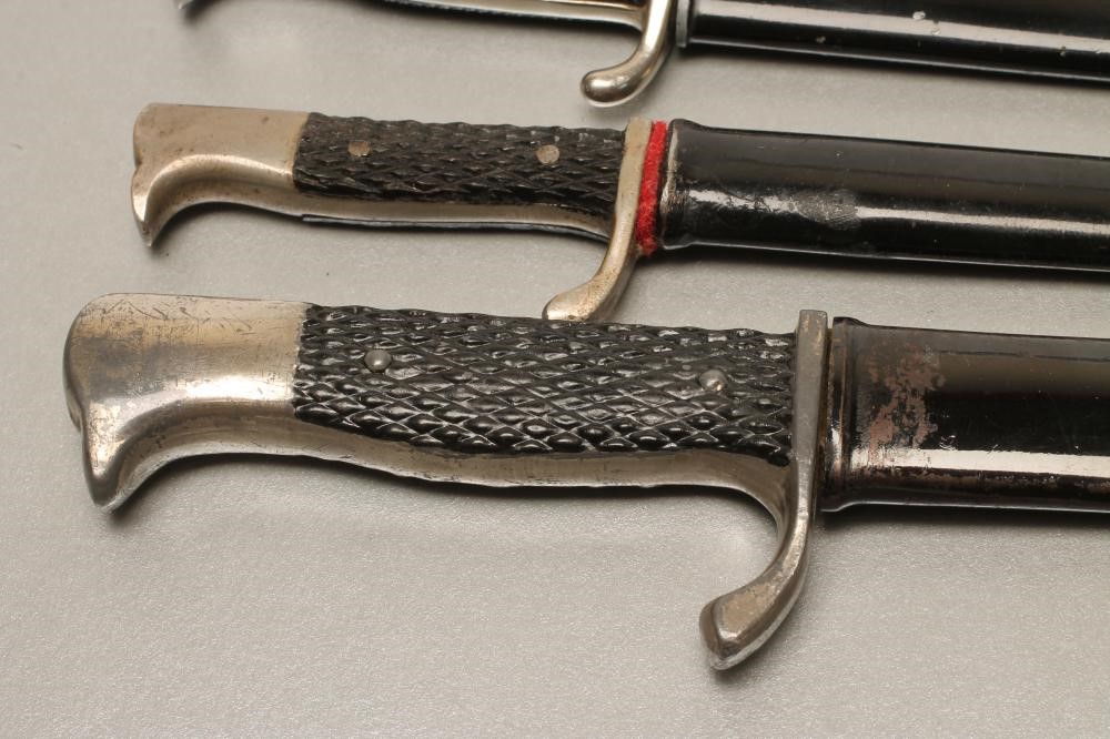 FOUR GERMAN MINIATURE SOUVENIR BAYONETS Image