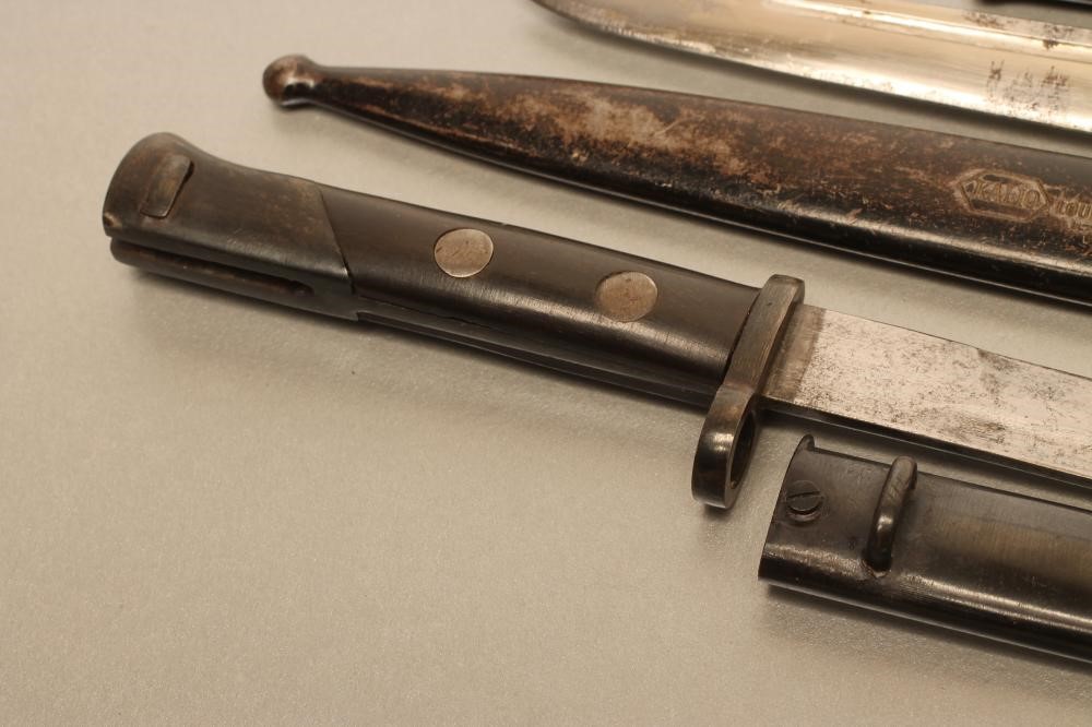 THREE GERMAN MINIATURE SOUVENIR BAYONETS Image