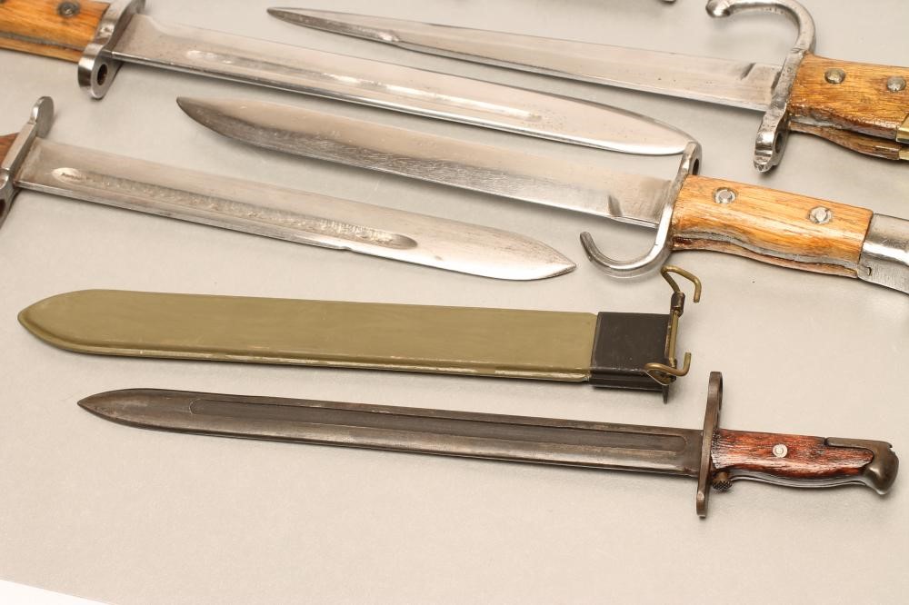 NINE MINIATURE SOUVENIR AND LETTER OPENER BAYONETS Image