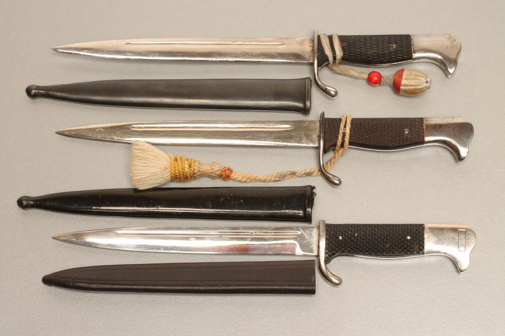 THREE GERMAN SOUVENIR MINIATURE BAYONETS Image