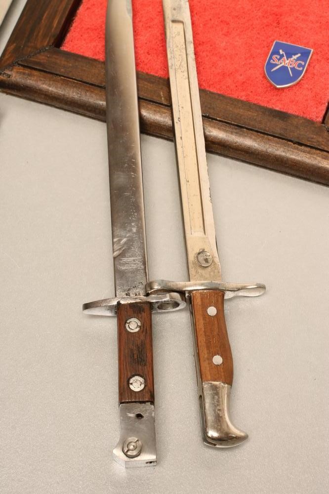 A COLLECTION OF MINIATURE BAYONETS Image