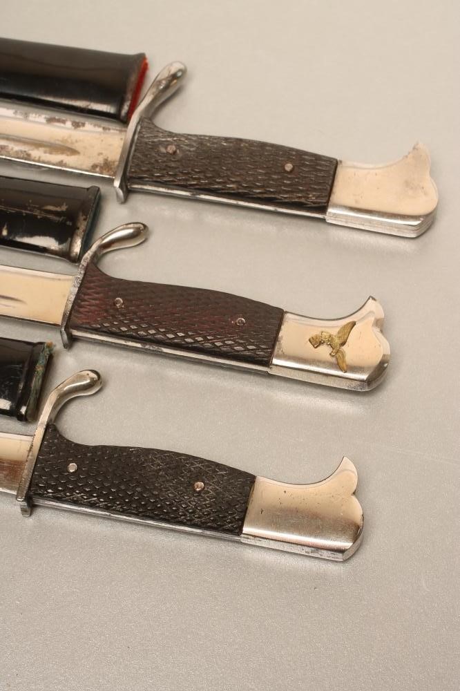 THREE GERMAN SOUVENIR MINIATURE BAYONETS Image