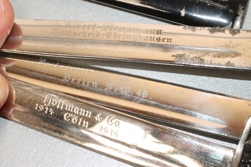 THREE GERMAN SOUVENIR MINIATURE BAYONETS Image