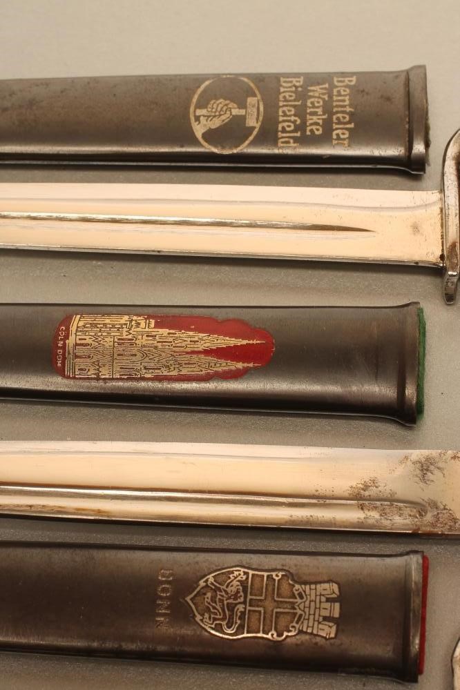 THREE GERMAN MINIATURE BAYONETS Image