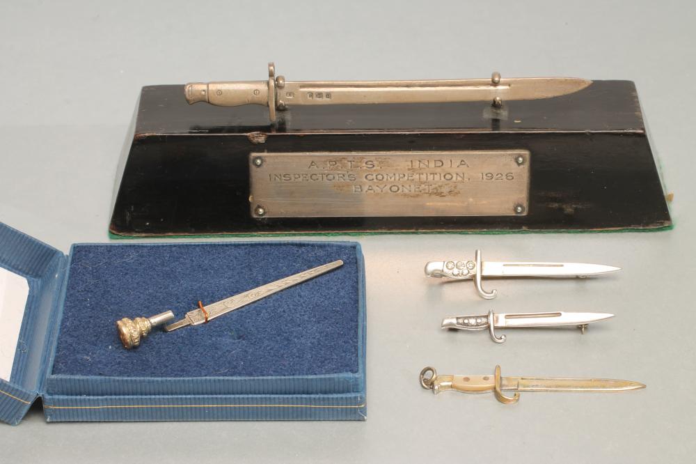 FOUR SILVER MINIATURE BAYONETS Image