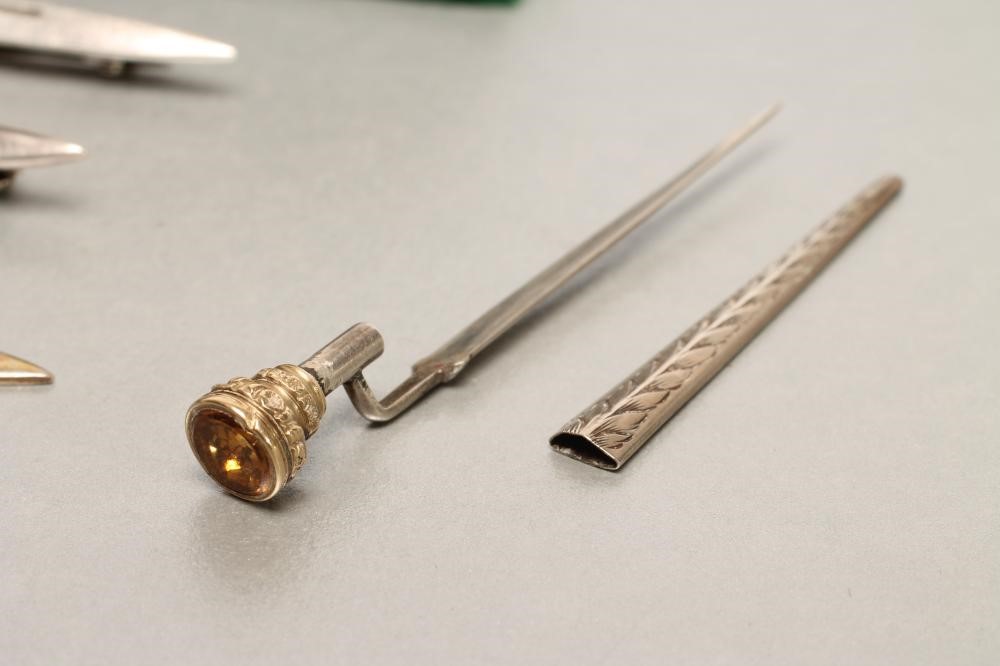 FOUR SILVER MINIATURE BAYONETS Image