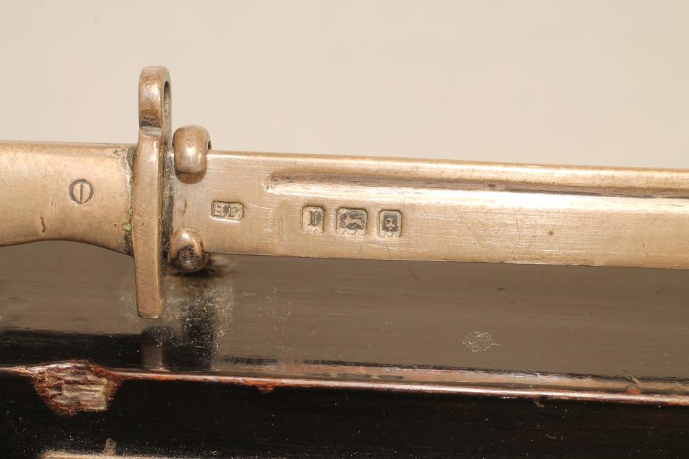 FOUR SILVER MINIATURE BAYONETS Image