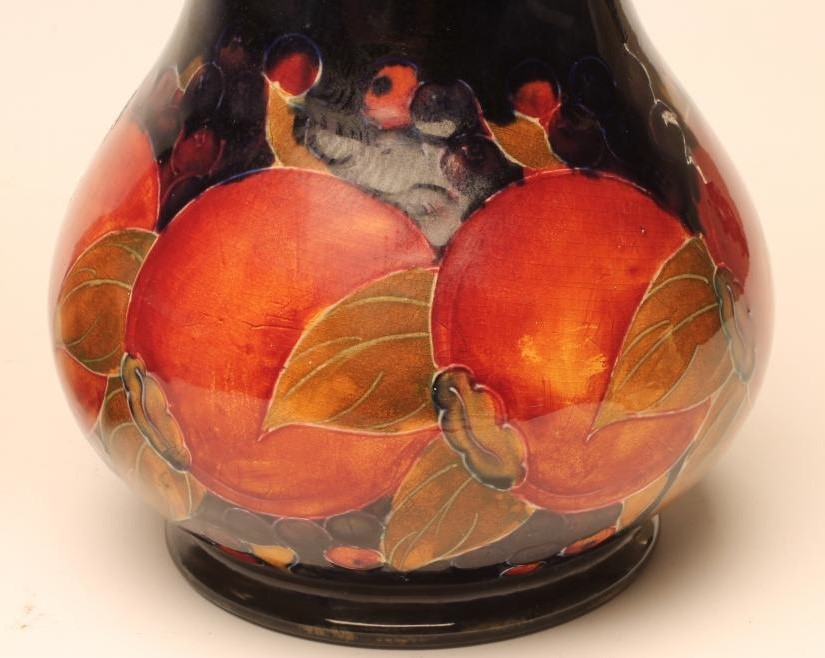 A PAIR OF MOORCROFT POTTERY VASES Image