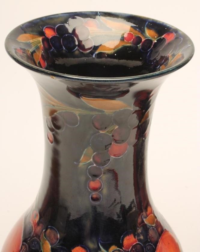 A PAIR OF MOORCROFT POTTERY VASES Image