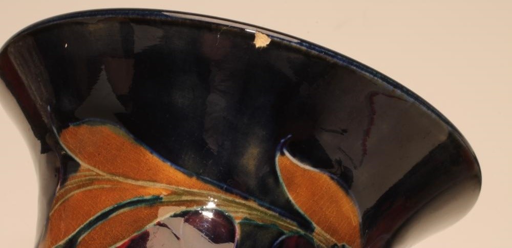 A PAIR OF MOORCROFT POTTERY VASES Image