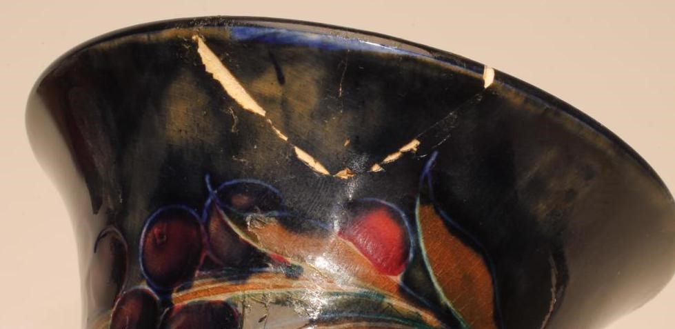 A PAIR OF MOORCROFT POTTERY VASES Image