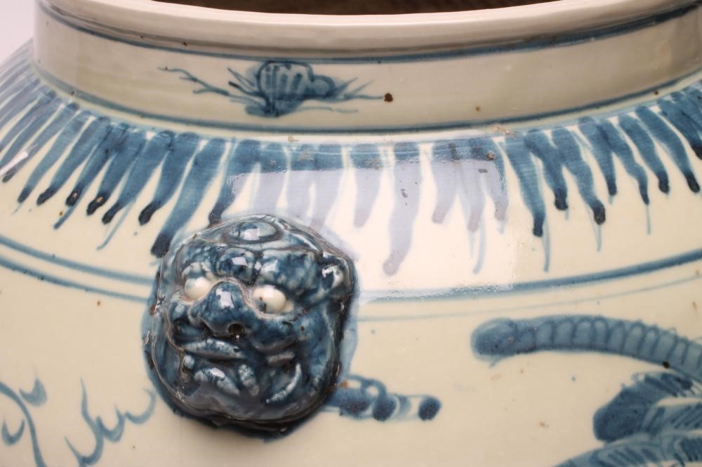 A LARGE CHINESE PROVINCIAL PORCELAIN JAR of ovoid form with four moulded and applied masks to the Image