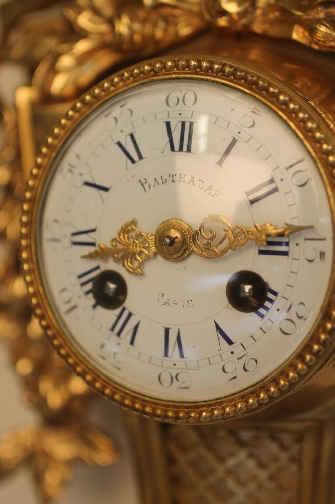 A FRENCH ORMOLU CASED CARTEL CLOCK Image