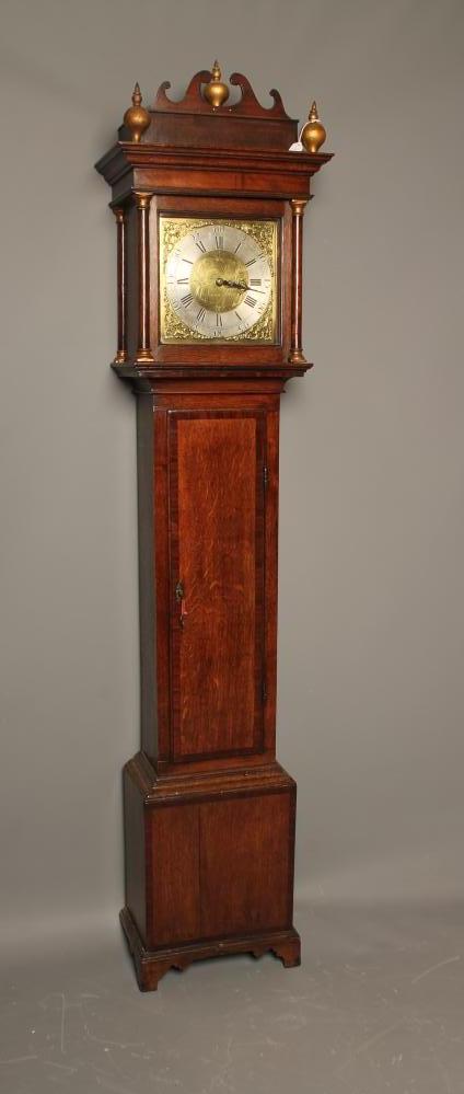 AN OAK LONGCASE CLOCK by James Pike Image