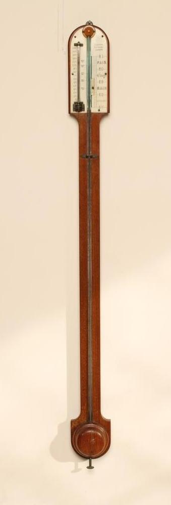 AN OAK CASED STICK BAROMETER by Negretti & Zambra Image