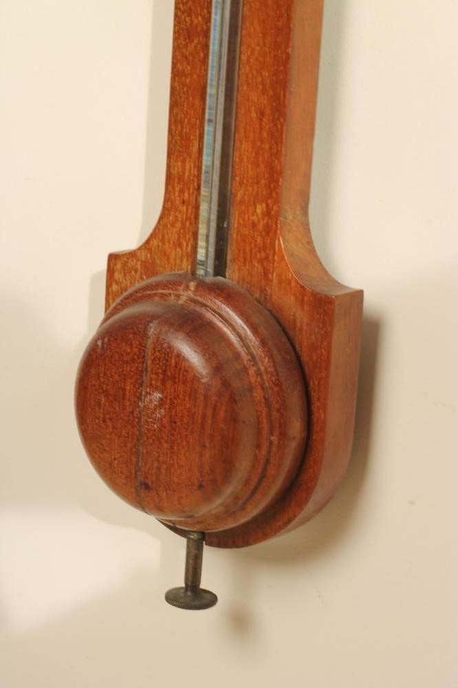 AN OAK CASED STICK BAROMETER by Negretti & Zambra Image