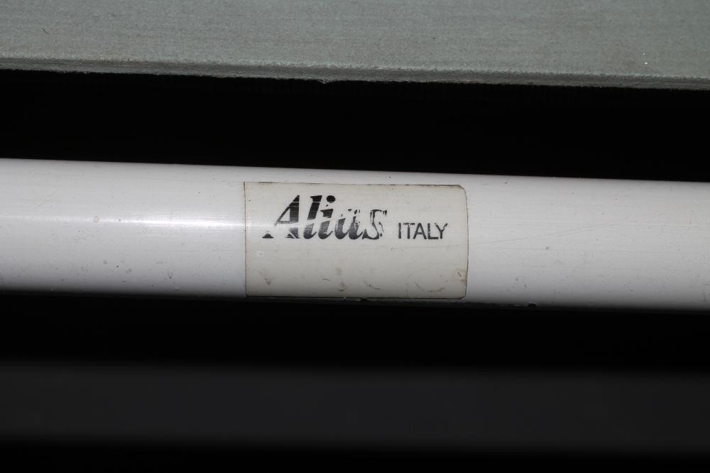 A PAIR OF ITALIAN SLING RETRO SLING CHAIRS in blue rubber and white painted tubular metal Image