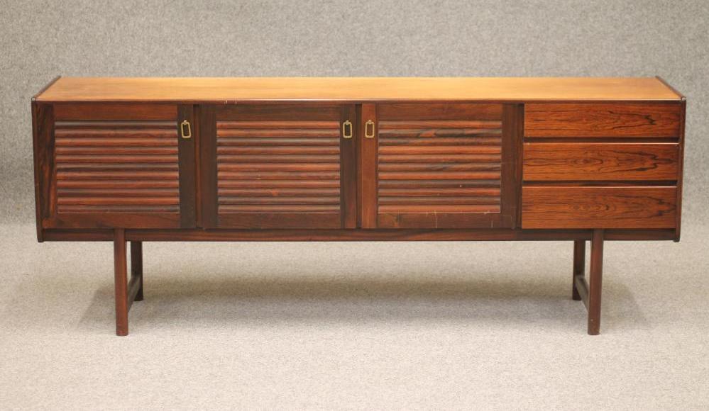 A SCANDINAVIAN ROSEWOOD SIDEBOARD Image