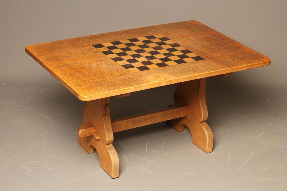 AN OAK COFFEE/GAMES TABLE by Martin Dutton Image