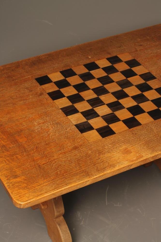 AN OAK COFFEE/GAMES TABLE by Martin Dutton Image