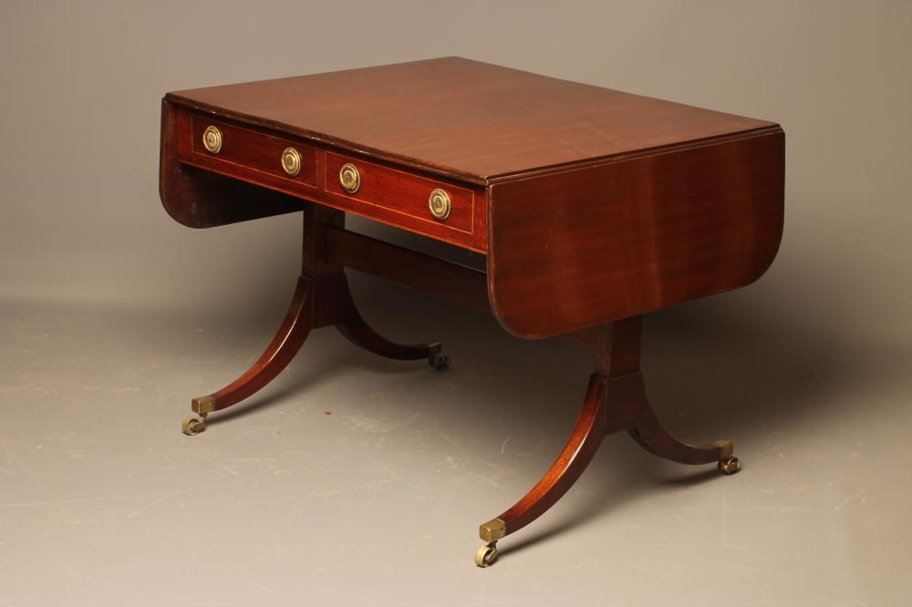 A MAHOGANY SOFA TABLE Image