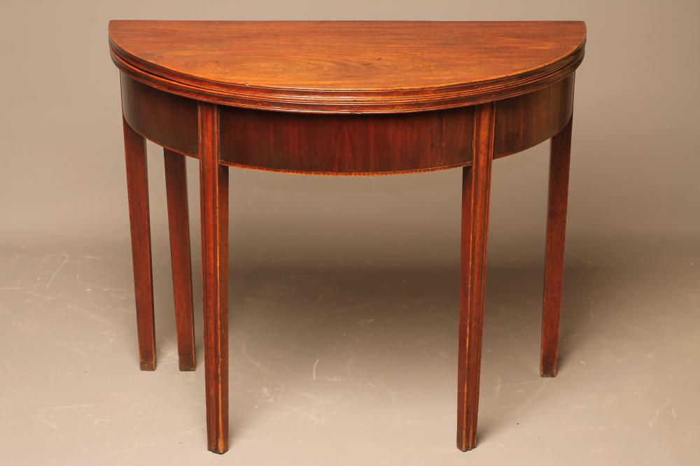 A GEORGIAN MAHOGANY FOLDING TEA TABLE Image
