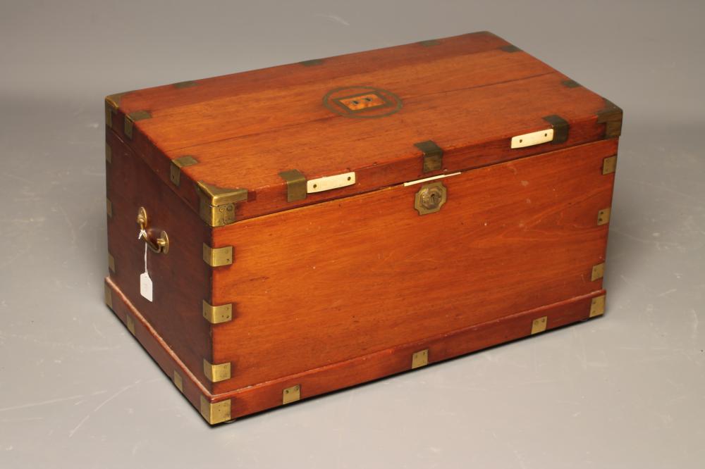 A MAHOGANY AND BRASS BOUND CHEST Image