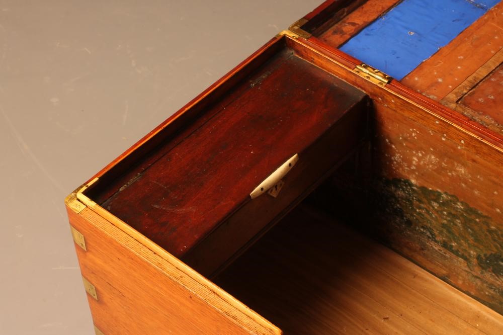 A MAHOGANY AND BRASS BOUND CHEST Image