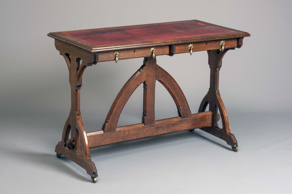 A GOTHIC REVIVAL OAK WRITING TABLE in the manner of A.W.N. Pugin (1812-52) Image