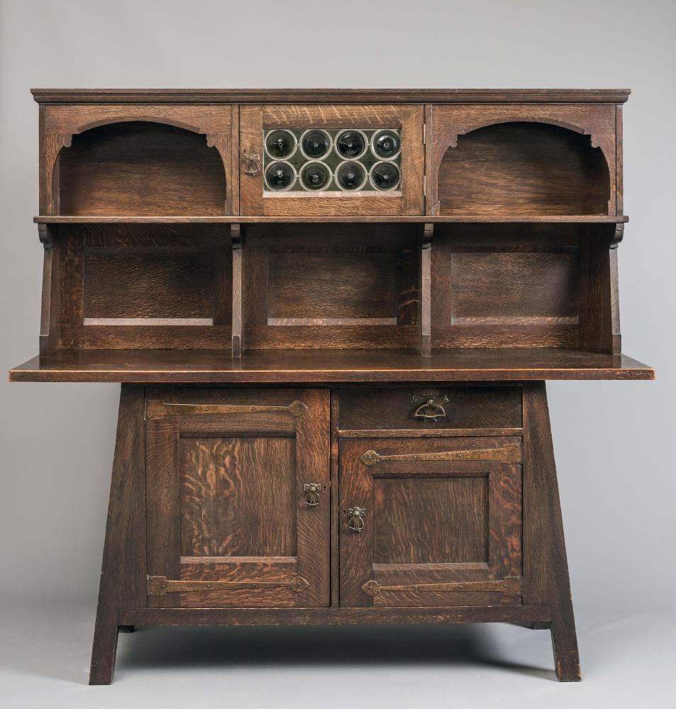 A LIBERTY & CO. ARTS AND CRAFTS OAK DRESSER Image