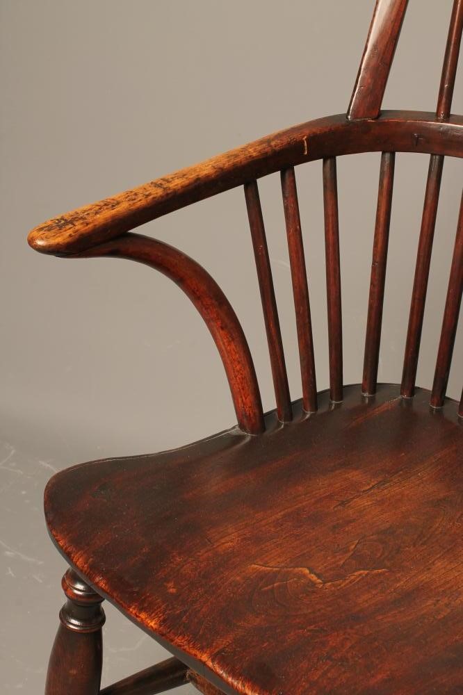 A HIGH HOOP BACK WINDSOR ARMCHAIR Image