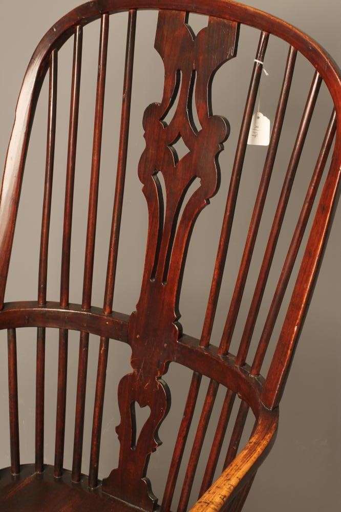A HIGH HOOP BACK WINDSOR ARMCHAIR Image