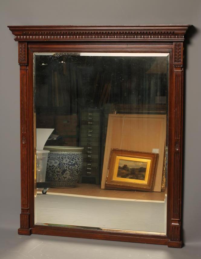 A LATE VICTORIAN OAK FRAMED PIER GLASS with bevelled oblong plate flanked by leaf capped fluted Image