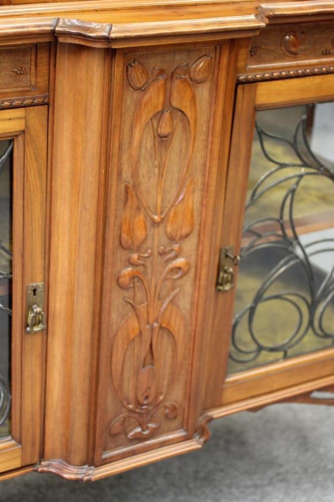 AN ART NOUVEAU MAHOGANY DISPLAY CABINET Image